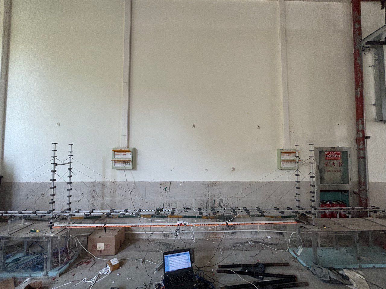 Laboratory beam with a dense accelerometer array used to benchmark low-cost units.