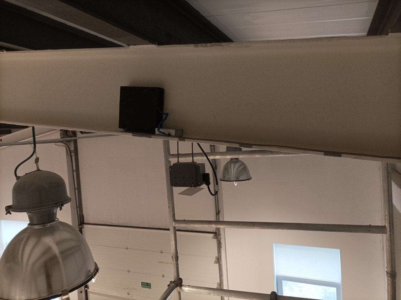 Node mounted on a roof beam for multi-month inclination records.